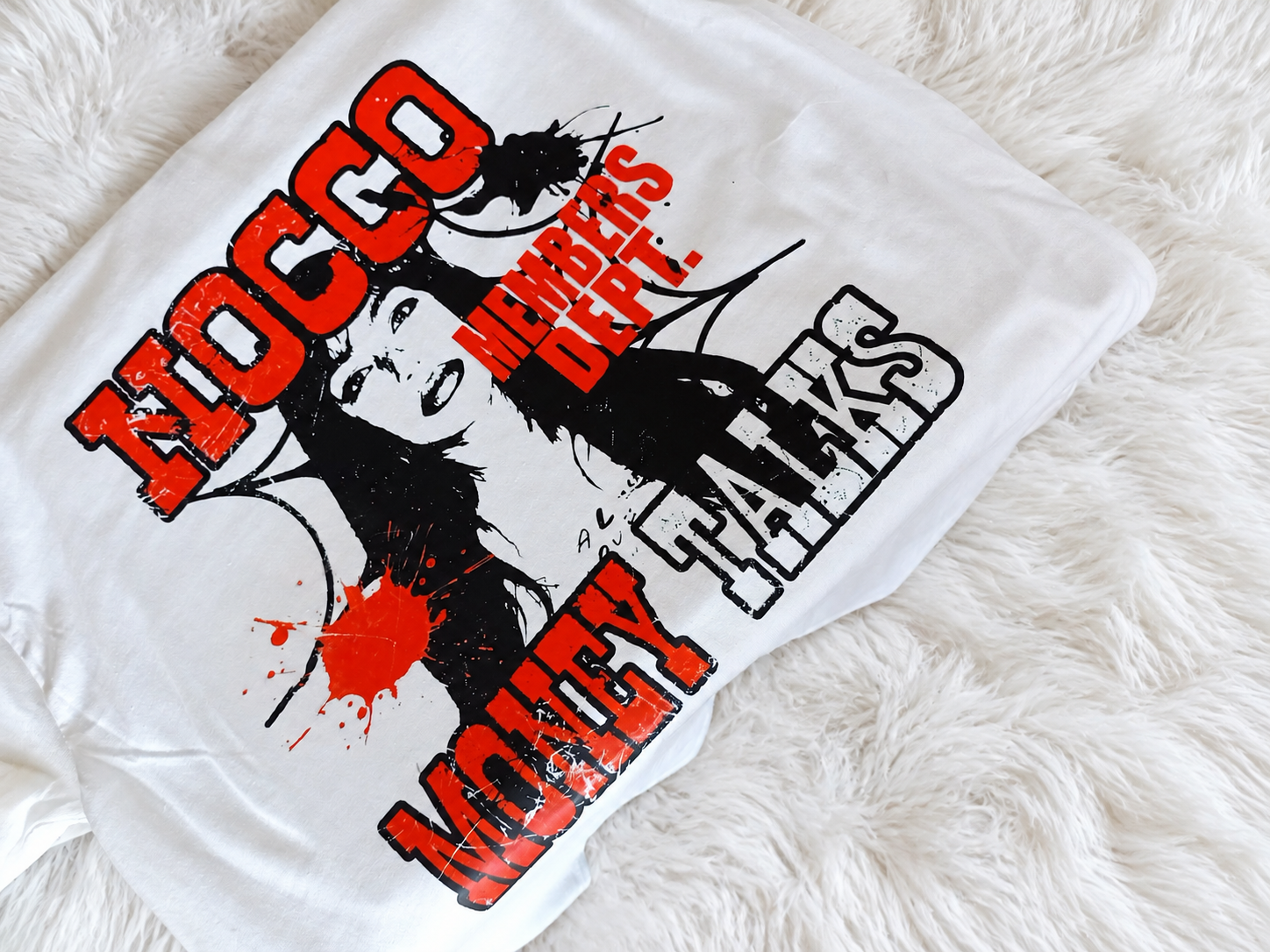 Custom red and black photo graphic shirt on a white plush rug